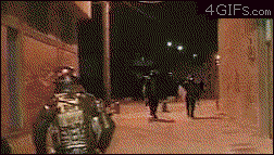 [Image: Riot_cop_point_blank.gif?]