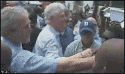 [Image: Bush_handshake_wipe_Clinton.gif]