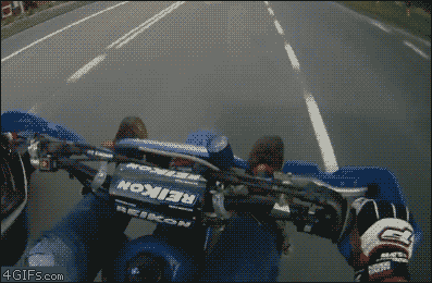 Motorcycle-stunt-bus-low-five