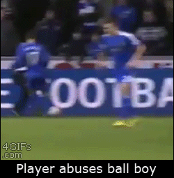 Soccer-footballer-kicks-ball-boy