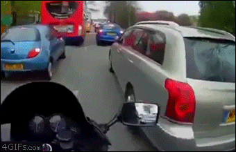 Polite-motorcyclist-fixes-mirror