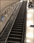 Drunk-guy-slides-down-escalator