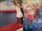 Girl-tumbling-gymnastics-roll-fail