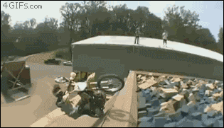 Motorcycle-jumps-foam-pit.gif