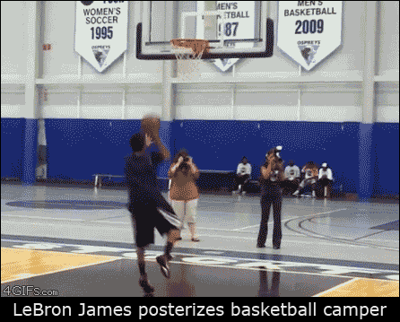 Lebron James posterizes a kid at basketball camp and sends him to the ground