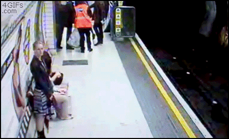 Woman-pushed-onto-train-tracks