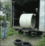 Unloading-cement-pipe-onto-tires