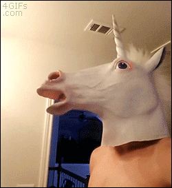 Unicorn Horse Head Mask brushes his chompers