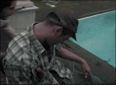 Friends prank a drunk guy passed out in a pool chair