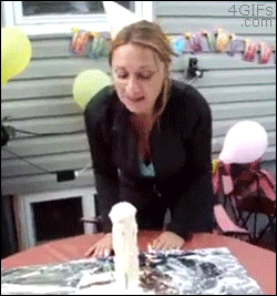 Woman gets a surprise when blowing out the candles