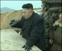 Kim Jong-Un is spying on a girl through his binoculars when he's interrupted by her boyfriendUnedited