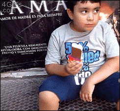 Father knocks an ice cream sandwich out of his kid's hand just to see his reaction, then gives him a new one