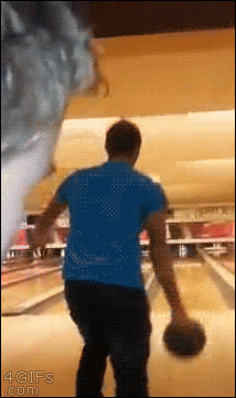 Bowler's fingers get stuck and he throws the ball into the ceiling