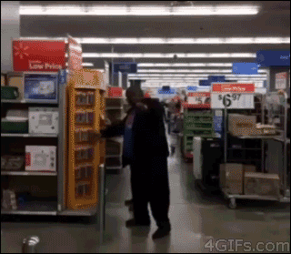 Three guys in Walmart re-enact a scene from Titanic with a shopping cart