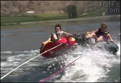 While tubing a guy falls out of his inner tube and then his friend unintentionally replaces him