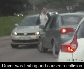 A man confronts a driver after they caused a collision while texting
