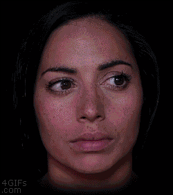 A woman uses makeup to show aging, death, and reincarnation