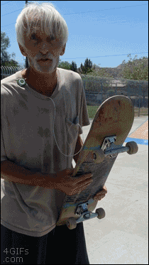 An old man has a cool skateboard trick