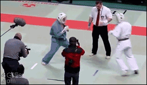 A karate referee flips out and attacks both fighters at a tournament