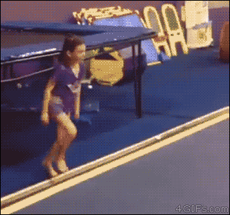 A young gymnast shows off her skills