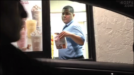 A thief fails to steal food while running past a drive thru window