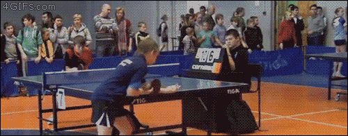 A kid loses at table tennis then pushes over the referee