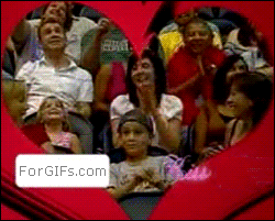 A boy on Kiss Cam gets kissed by multiple women
