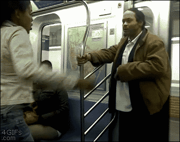 Snackman casually breaks up a fight on a subway