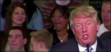 A girl acts funny in the background of a Trump speech