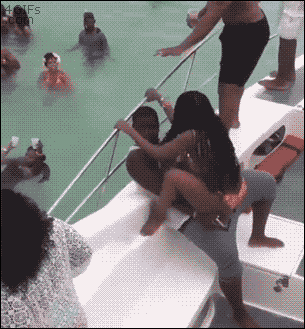 A girl is thrown off of a boat