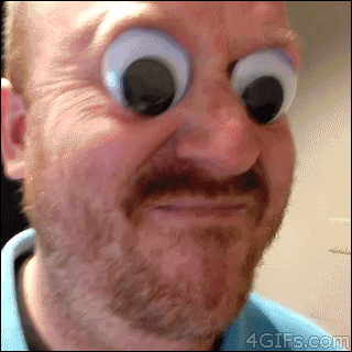 A guy with googly eyes mimics a tower disc tray with his tongue