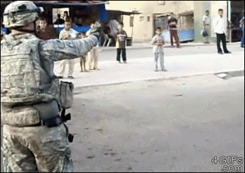 A soldier in Baghdad trolls a driver