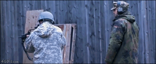 Soldier casually catches a hot bullet casing