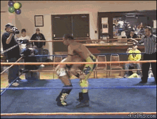 A wrestler uses an acrobatic flip slam