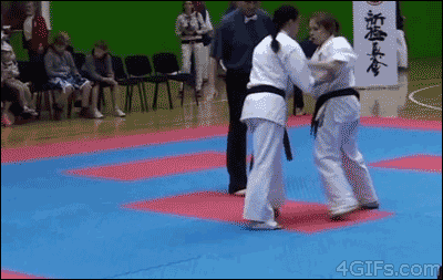 A girl gets a KO with an unusual kick