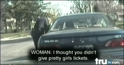 A cop burns a woman while giving a ticket